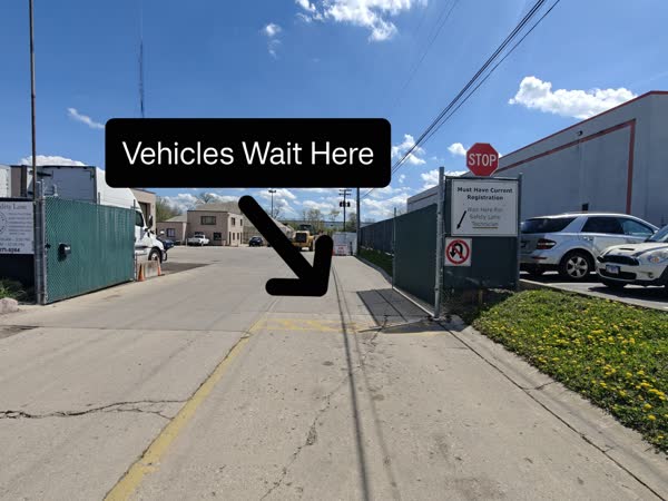Designated vehicle waiting area for customers at James Drive Safety Lane.